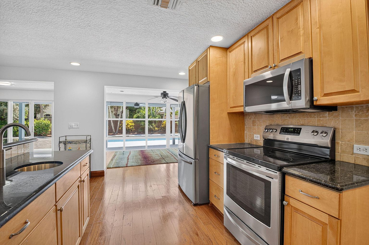 Kitchen looking toward the family room, 1170 SW 21st Street, Boca Raton FL